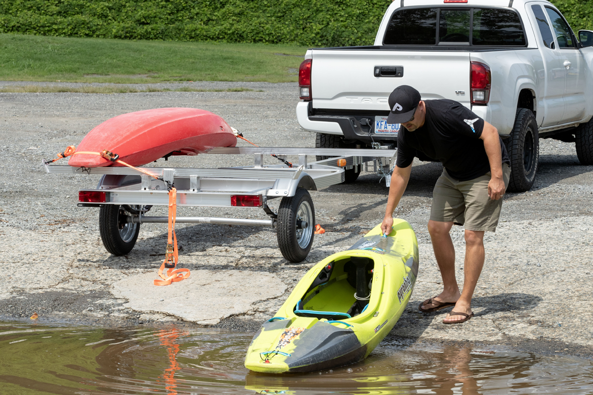 Pulling Kayak Out Of Water With Two-Place LXT-LK Trailer