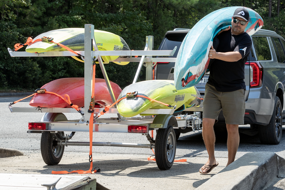 Unloading Kayaks From A Four Place LXT-LK Trailer